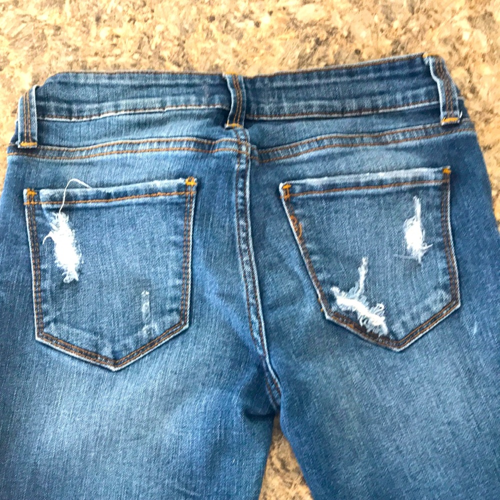 Distressed Denim Jeans